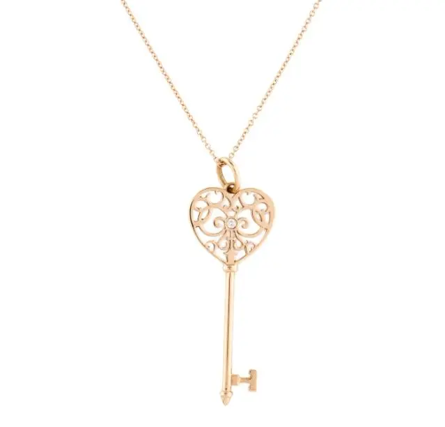 Pre-owned Tiffany & CO ENCHANT heart key pendant necklace 18K yellow gold & DIA