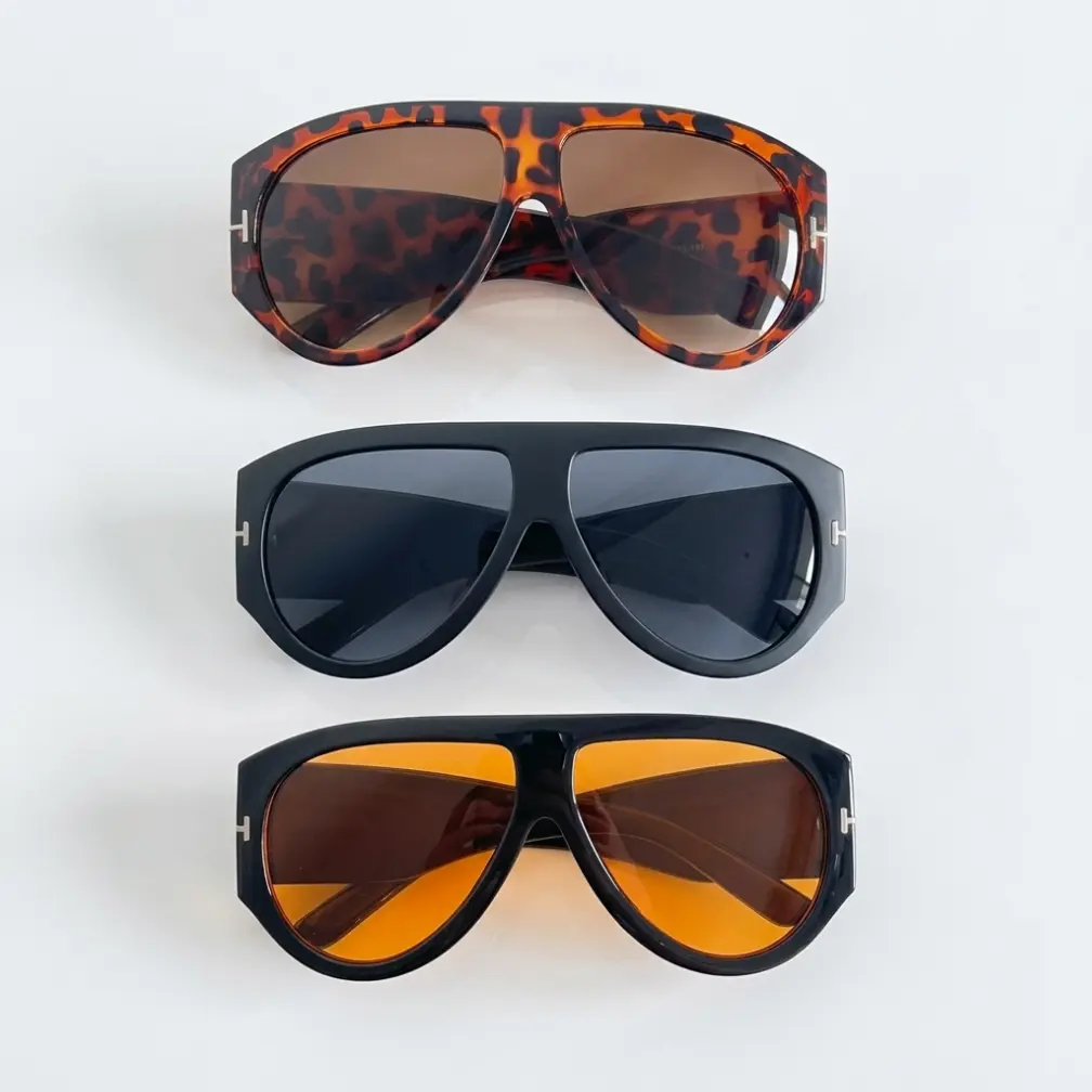 Trendy Leopard Print & Black Frames Sunglasses with Brown, Orange, and Black Lenses for Stylish Protection