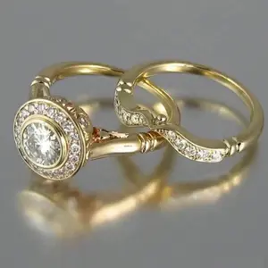 2 Halo rings with shiny Cubic Zirconia stones plated in 18K gold for brides to attend engagement parties and as gifts