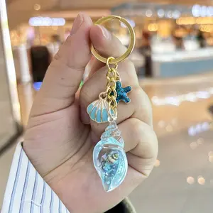 New dripping oil beach shell and starfish alloy keychain resin cute schoolbag pendant conch luminous pendant keychain