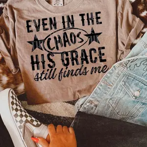 Even in the chaos His grace still finds me comfort color tee