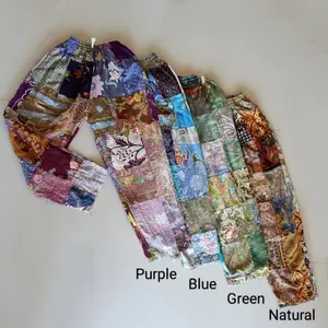 Patchwork Pants by Lotus Tribe 100% cotton upcycled gender neutral hippy style handmade pants. Elastic waist 2 side pockets.