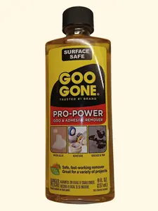 Goo Gone Original Liquid - 8 Ounce and Sticker Lifter - Surface Safe Adhesive Remover Safely Removes Stickers Labels Decals Residue Tape Chewing Gum Grease Tar Crayon Glue