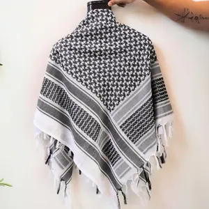 Traditional woven Palestinian Keffiyeh, Kufiya, Shemagh, or scarf with classic Palestinian patterns