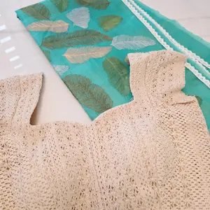 Teal blue organza saree with leaf embroidery