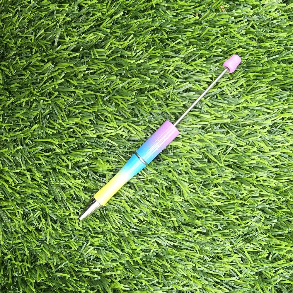 16 Character topper, plastic, refillable, beaded pen.