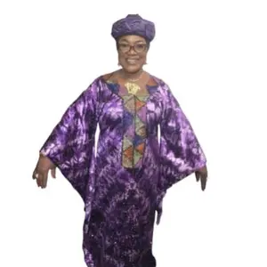 Africa Native Colorful Beaded Dress with Vibrant Purple Tie-Dye Pattern and Traditional Bead Accents