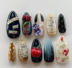 Twilight-inspired nail art featuring iconic quotes, 3D roses, an apple, and dark mystical vibes with blood-red details for a dramatic gothic look