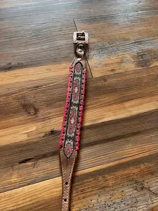 Genuine leather dog collar with pink, white, and gold southwest beaded inlay design, a rawhide wrapped edge