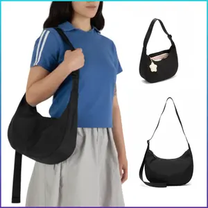 [Free ship] BAGGU Medium Nylon Crescent Bag – Casual & Spacious with Zippered Pockets, Adjustable Strap, Made from 100% Recycled Nylon