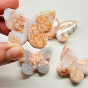 Pink agate palm stone carved butterfly