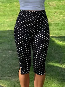 Women's Polka-Dot Slim-Fit Cropped Pants with Side Slits—Stretchy Casual Capris, Perfect for Everyday Wear and Outings.
