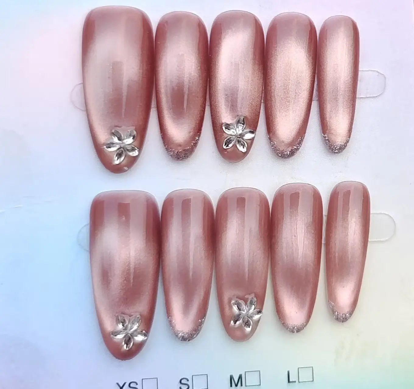 Handmade wearable nails: floral and water-drop designs, flattering for fairer-looking skin; gradient‑style fall manicure; mid‑length, detachable nails.