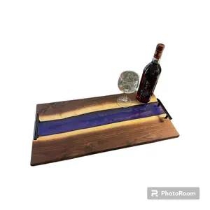 Black Walnut Charcuterie Board that has a purple resin river and black handles: Live Edge Epoxy River. Homeware Knives Chopping. Home essentials.