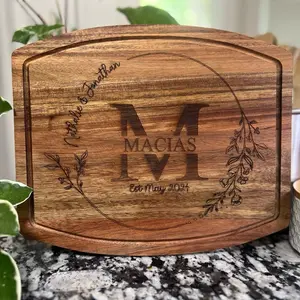 Customized Cutting Board! Get a perfect chopping block gift or decor for your own kitchen! Engraved to order and engraved on acacia wood and sealed with food safe mineral wax. Initial and name included in monogram.