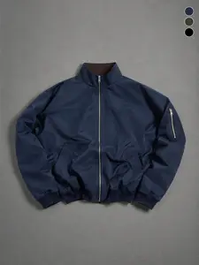 Men’s navy blue aviator jacket featuring a clean, minimalist design and tear-resistant fabric; suitable for urban exploration, weekend trail hikes, and casual gatherings, with a modern street-style look.