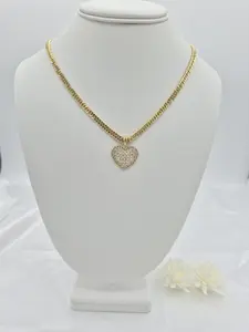 14k gold plated chain with heart pendant and cubic zirconia stones.(32)