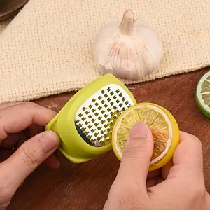 A Compact Grilling Tool for The Kitchen, This Manual Grinder for Ginger And Garlic Is a Sturdy Utensil for Shredding Food And Grilling. It'S a Versatile Handheld Kitchen Gadget That'S Easy to Carry, Making It Perfect for Camping