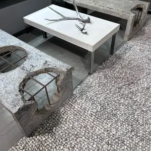 Industrial Concrete Coffee Table with Exposed Rebar, Durable Design, Ideal for Industrial Use
