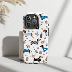 A cute floral and stylish artistic design for dachshund lovers. Durable, shock-absorbing, glossy 2-in-1 phone case, compatible with iPhone 17, 16, 15, 14, 13, 12, 11, X, Samsung and other models. Makes a great holiday gift for friends or family.