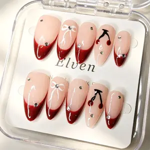 Handmade Nude Red Press On Nails - French Tip with Hand-Painted Bow & Cherry, Medium Long Almond Reusable Fake Nails with Rhinestone Decor, Salon Quality