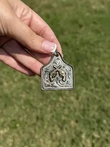 Crossed Pistols Cow Tag Pendant