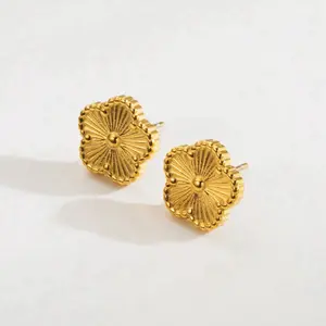 Clover Stud Earrings - Gold-Tone Design with Unique Patterned Surface