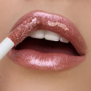 Center Stage | A Soft Sable Rose Lip Oil with Multifaceted Shimmer