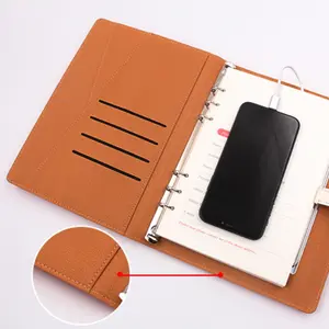 The charging notebook combines the functions of writing and charging. With a built-in module to power electronic devices, it is an excellent choice for mobile office work and study