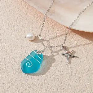 Blue Sea Glass Pendant with Marine Elements