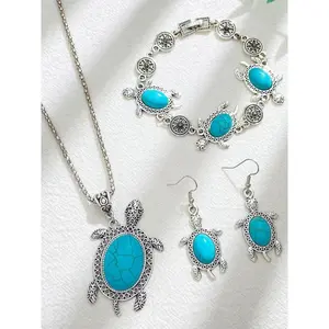 Women’s bohemian-style jewelry set featuring a turquoise sea turtle design, including a necklace, bracelet, and pendant earrings; vintage fashion jewelry set suitable as fashionable accessories for women and girls. GARMENTARY