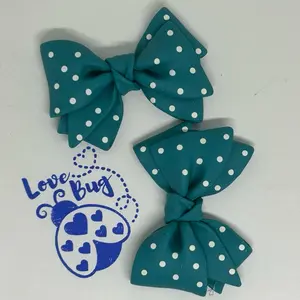 2inx2.5in clay flat back bows. Perfect embellishment for any badge reel, flat back beads or just the perfect decoration on for any DIY project you have.