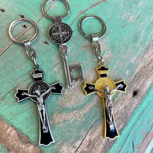 St Benedict Keychains - Gold Cross with Keyring, Black Cross with Keyring, and Silver Cross with Keyring
