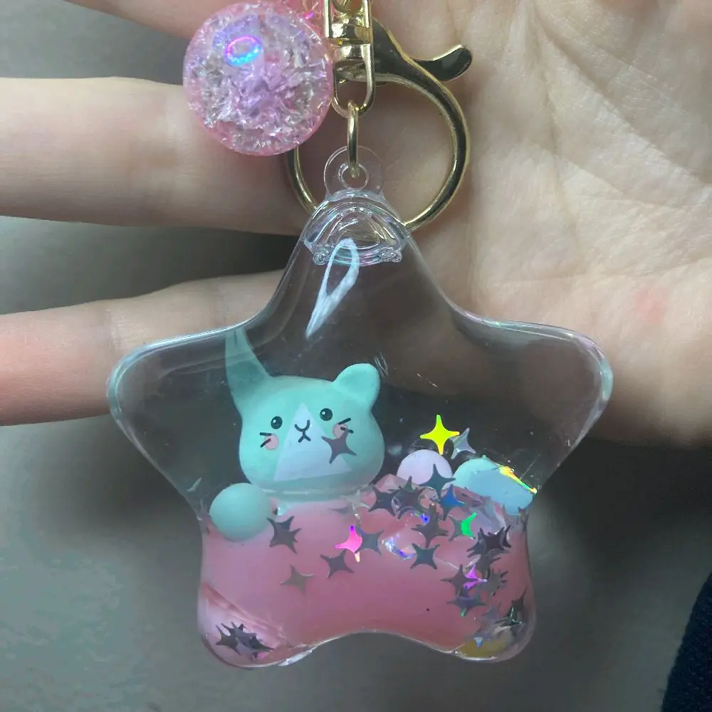 liquid filled globe, star, or shell keychain for purse or bag with cute creature inside, water ball charm gift