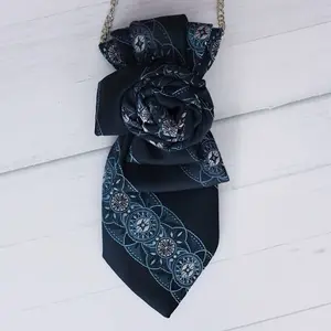 Trendy women’s tie navy with blue accent and rose deign
