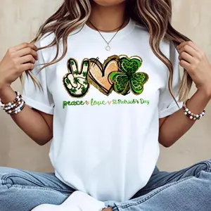 Celebrate St Patrick's Day with Comfortable Cotton Short Sleeve Crew Neck T Shirt Featuring Peace Love Design Perfect for Summer Casual Wear Easy to Wash and Made in USA