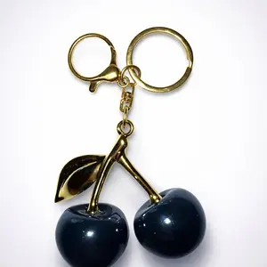Cute Cherry Keychain Glossy Double Cherry Charm for Bags & Keys with Gold Tone Metal Ring and Leaf Detail