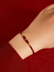 Adjustable Women's Bracelet with Lucky Charms, Designed in Hand Woven Bohemian Style, in Red and Gold, Adorned with Beads and Talismans, Suitable for Casual Wear All Year Round