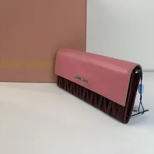 Pre-owned miu miu Matelassé Bi Color Leather Continental Wallet