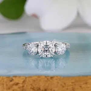 Round Cut Three Stone Engagement Ring