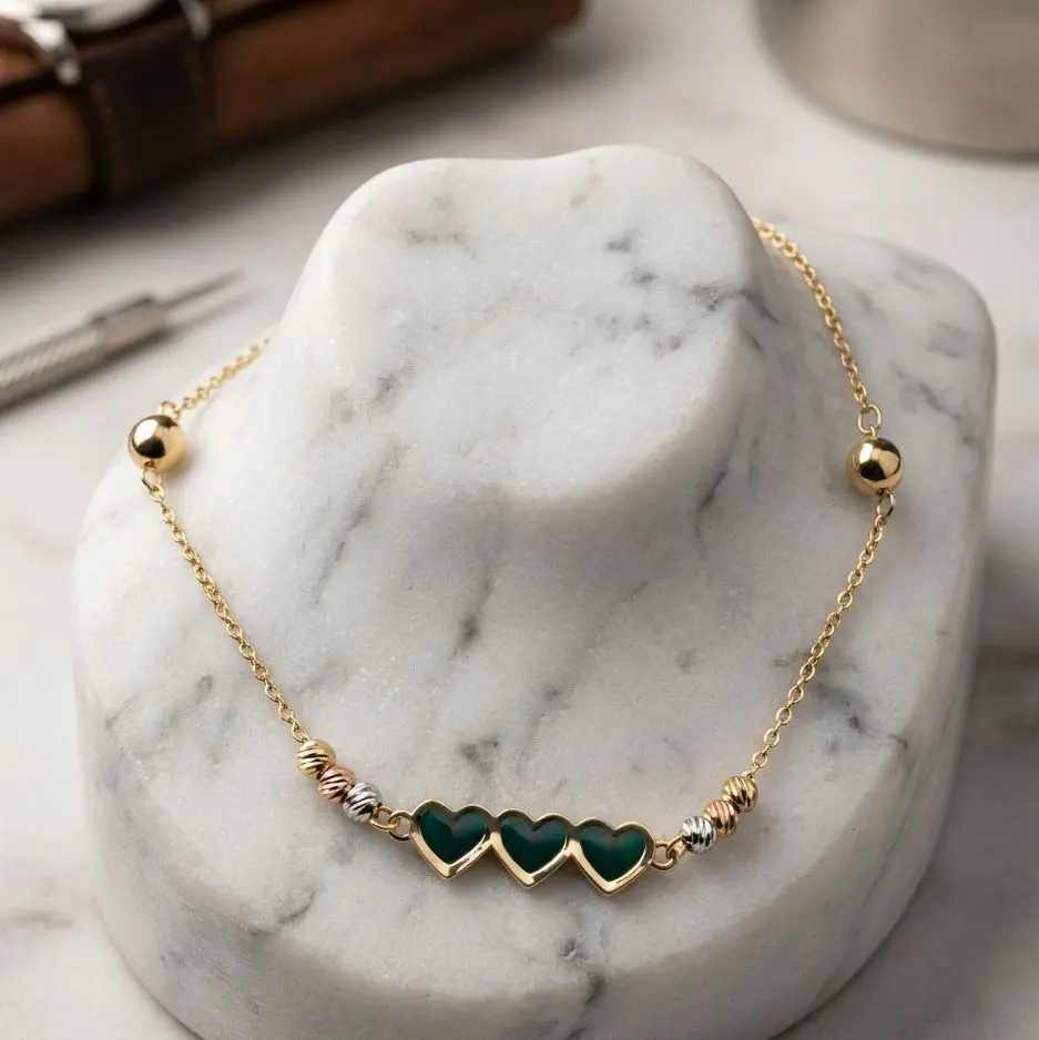10K Yellow Gold Triple Heart Bracelet – Size 8 10K Yellow Gold Triple Heart Bracelet – Size 8