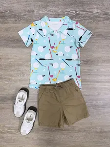 SYDNEY SO SWEET Golf Print Boys Blue Polo Shirt for Back to School and Everyday with Colorful Clubs and Golf Balls on Light Blue Background