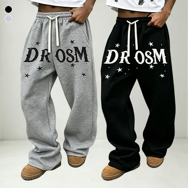 Men’s fashion letter-print sweatpants—loose, casual athletic long pants with a relaxed, stretchy fit and a drawstring waist; suitable for all seasons; street-style loose sports pants; great for back-to-school looks; ideal for autumn and winter.