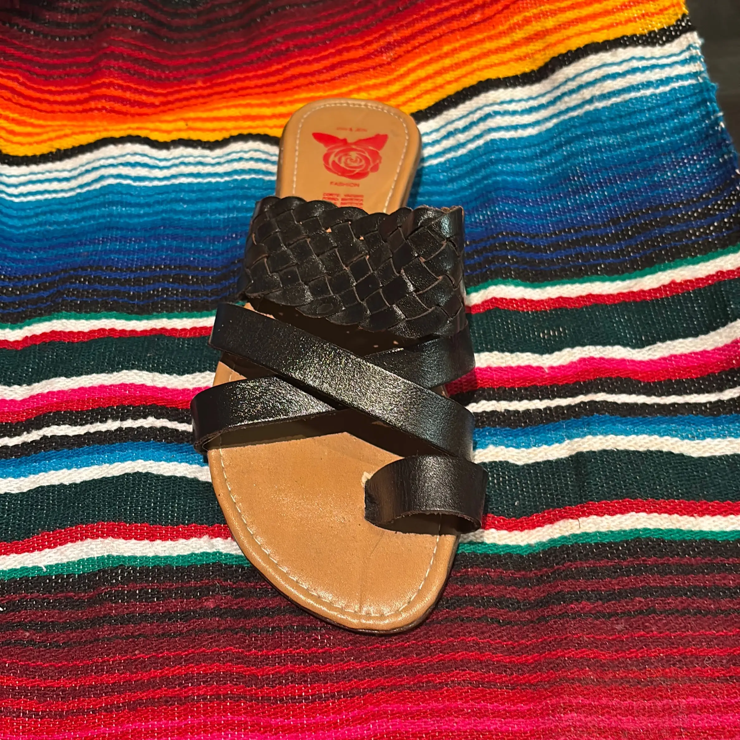 Black leather crossed sandal