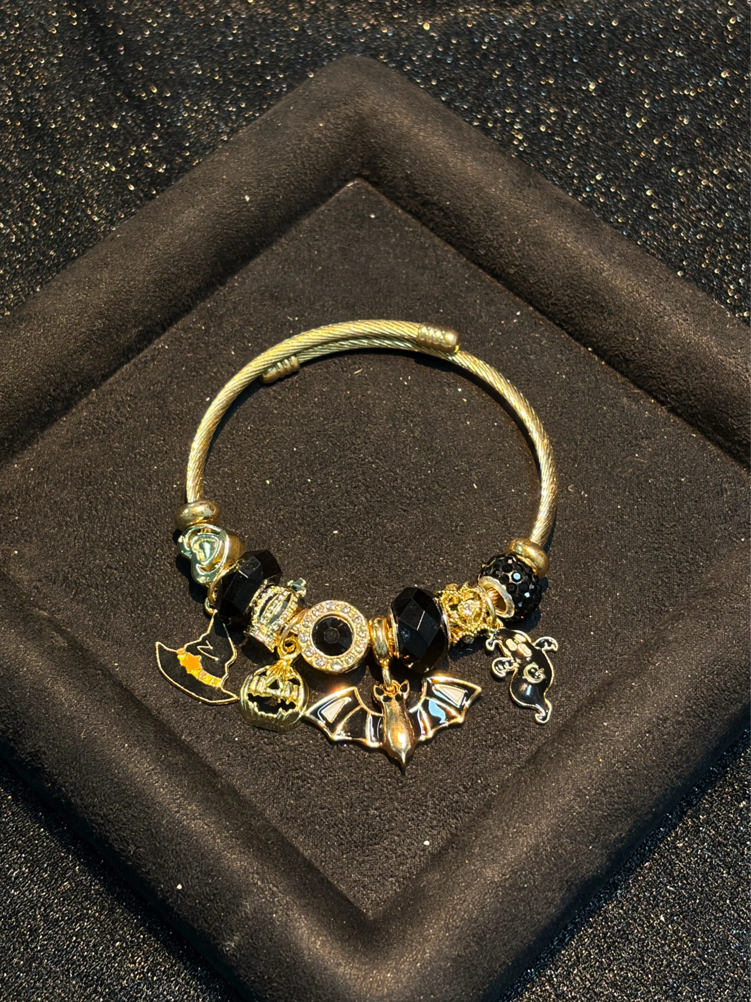Women's Gold-Tone Open Cable Charm Bangle with Black Crystal Beads, Halloween Witch Hat Pumpkin Bat Ghost Charms, Stackable Costume Jewelry Bracelet