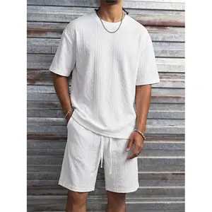 Men’s CleanFit minimalist textured jacquard set — summer loose short-sleeve T-shirt + shorts two-piece set, solid color with a premium feel, versatile for everyday wear and commuting.