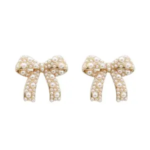 Klinn Pearl Accent Bow Stud Earring