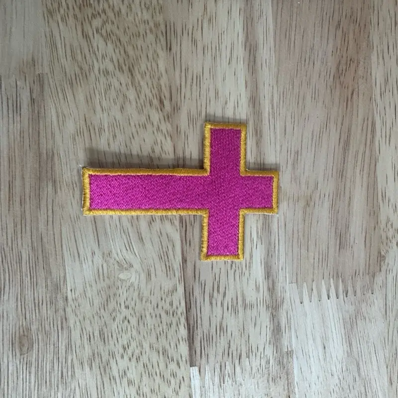 Pink and gold cross iron on patch