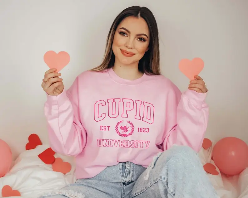 Cupid University Sweatshirt, Cute Valentine's Day Shirt, Funny College Sweatshirt, Love Crewneck Sweatshirt, Cupid Sweater, Cupid Crewneck Sweatshirt, Valentine's Day Fashion, Cute Valentine's Sweater, Romantic University Clothing