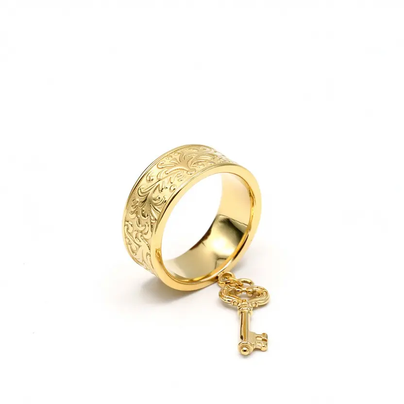 Gold Key Ring with Intricate Engraving and Key Charm for Stylish Accessory